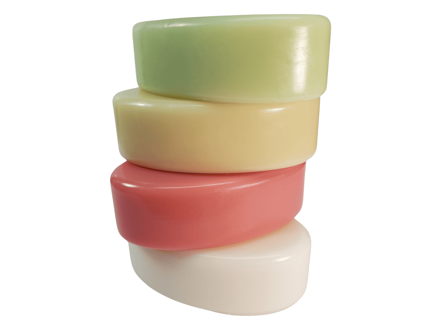 A stack of four handmade oval shaped goat milk soap bars. Green, tan, red, white.