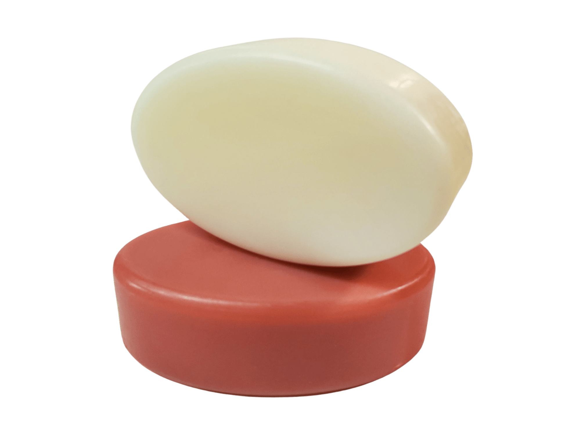 Two oval shaped bars of handmade goat milk soap.