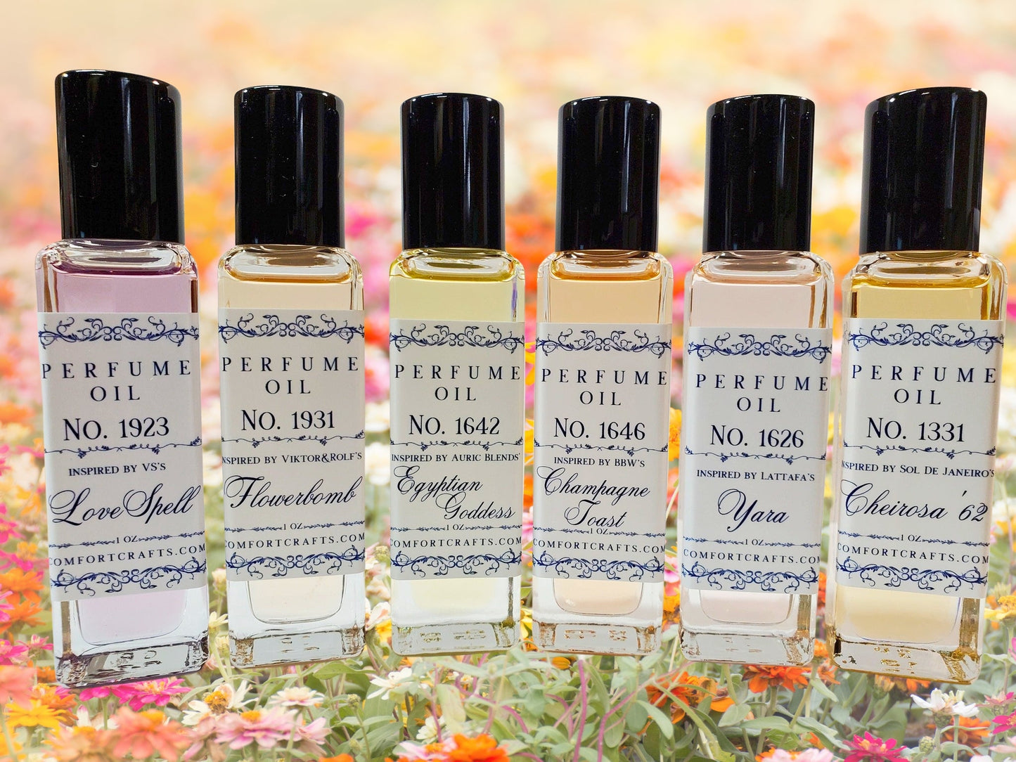 Six bottles of one ounce women's perfume oil with a pink, yellow, and orange floral background.