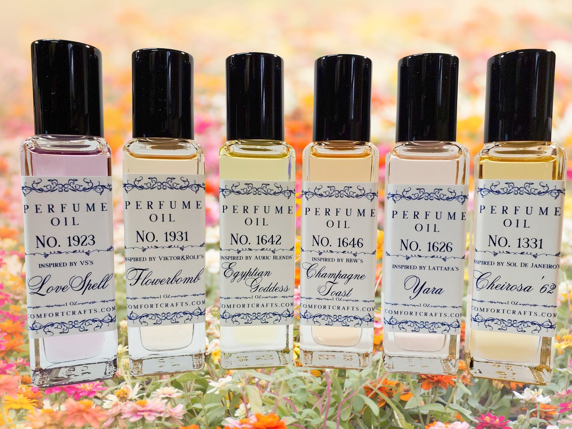 Six bottles of one ounce women's perfume oil with a pink, yellow, and orange floral background.